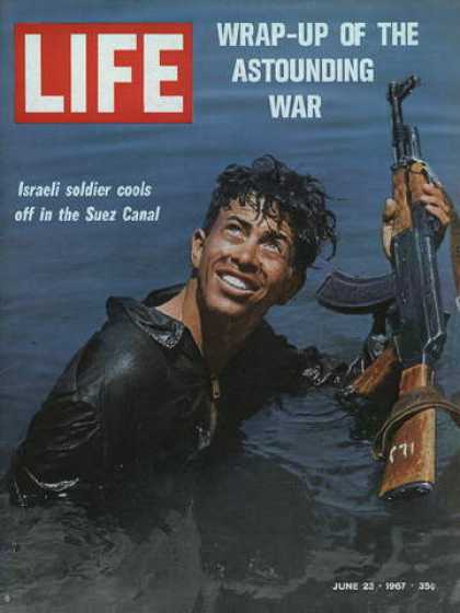 Life - Israeli soldier cools off in the Suez Canal