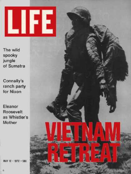 Life - Vietnam soldier carries wounded buddy