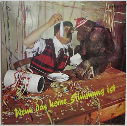 Oddest Album Covers - <<Man offers chimp herring after party>>