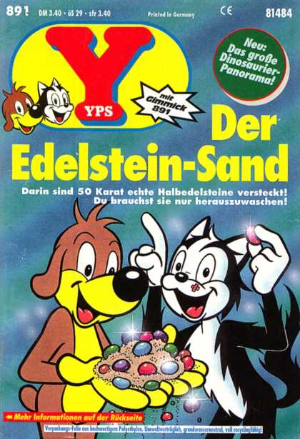 Yps - Der Edelstein-Sand - Der Edelstein Sand - White And Clack Cat - Brown Dog - Colored Rocks - Sand